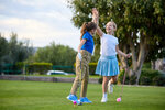 Two girls playing golf at Massanutten Resort