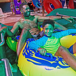 families enjoying time spent on slides at Massanutten Indoor water park