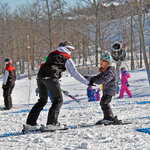 An instructor teaching a ski lesson at Massanutten Resort