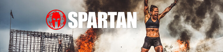 A woman participating in a Spartan race at Massanutten Resort