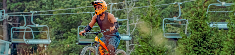 Massanutten Bike Park boy riding bike in the summer