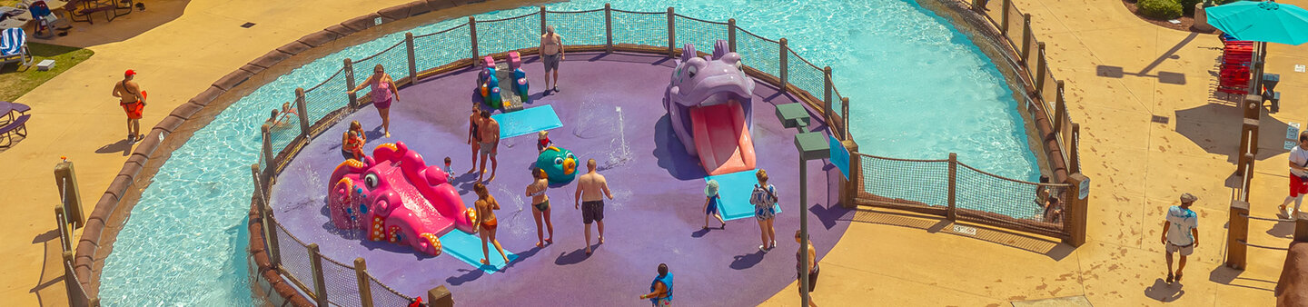 Children splashing in the kids zone at Massanutten outdoor water park