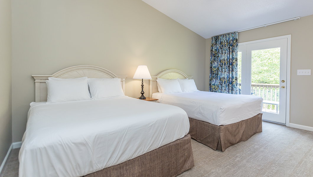 A photo of a bedroom of an Eagle Trace condo at Massanutten Resort